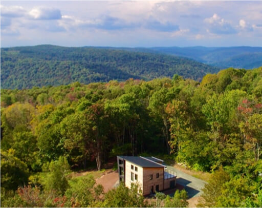 These New Eco-Friendly Homes in Upstate New York Turn Wood Into a Luxury Material