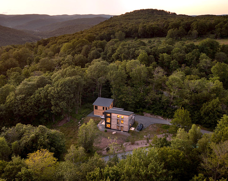 The Catskill Project house at sunset
